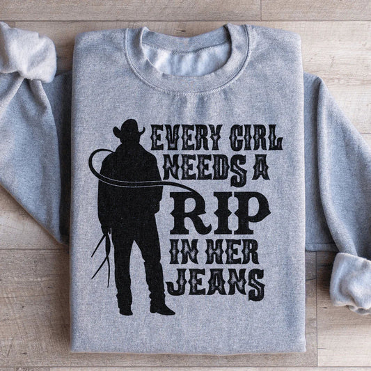 Toda chica necesita un roto en sus jeans sudadera