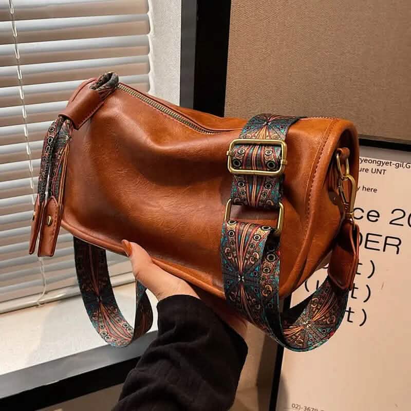 Bandolera con cremallera y estampado gráfico