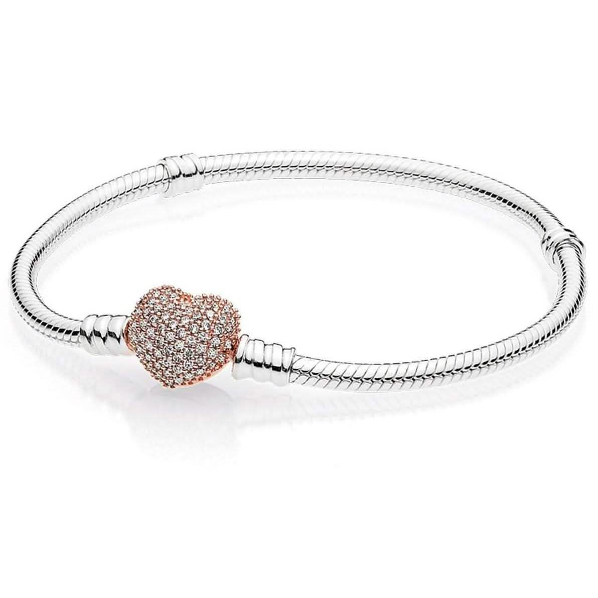 Pulsera con dije de corazón de cristal en oro rosa micropavé