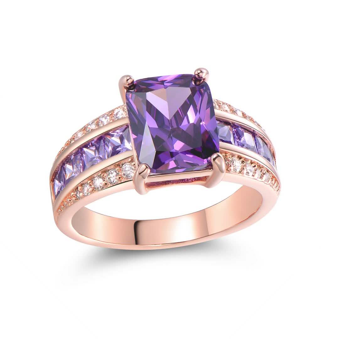 Anillo de princesa de tanzanita morada y oro rosa de 18K