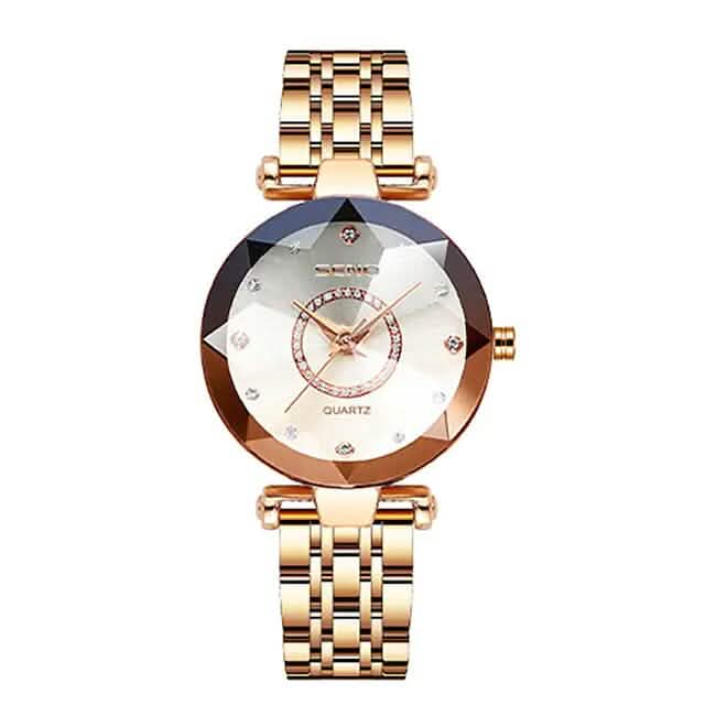 Reloj clásico de cuarzo dorado y plateado para mujer